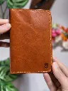 Full-grain leather passport holder.webp