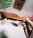 Side profile of full-grain leather passport holder.webp